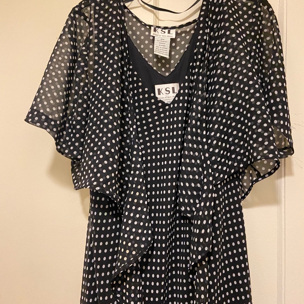 Two piece polka dot dress. Sleeveless dress with cover up that ties.